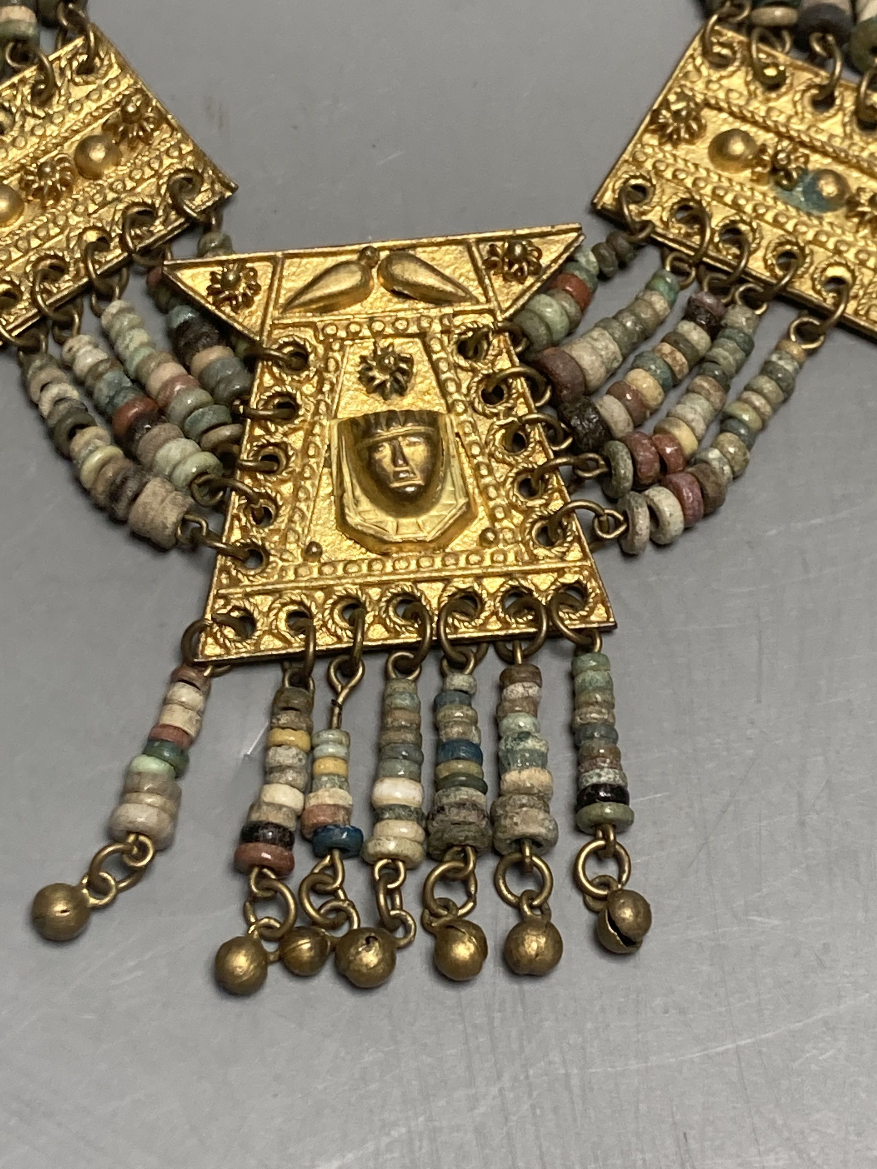 An antique Mayan? gilt metal and hardstone set drop necklace, 42cm.
